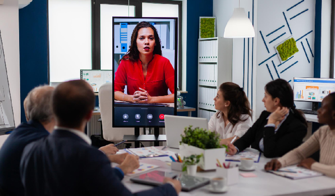 A corporate virtual event screen showing a speaker on one side and a live audience polling question with real-time results on the other