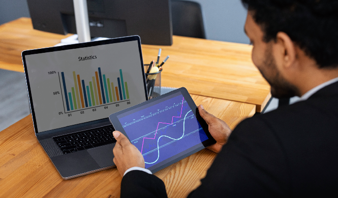 A sponsor's dashboard on a laptop screen displaying a high-level overview of their return on investment (ROI) from an event with key metrics and data visualization